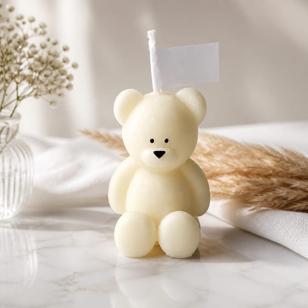 Candela orso seduto con confezione regalo, fotografia 1